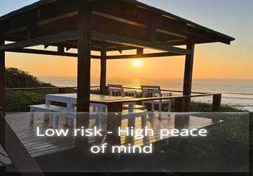 gazebo overlooking sunset and ocean