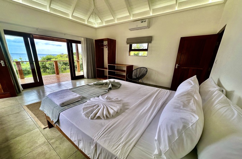 Bedroom with sea views at Makana 7 in Ponta Mamoli