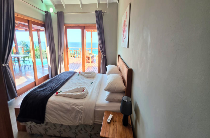 Bedroom with seaview at Makana 3B in Ponta Mamoli
