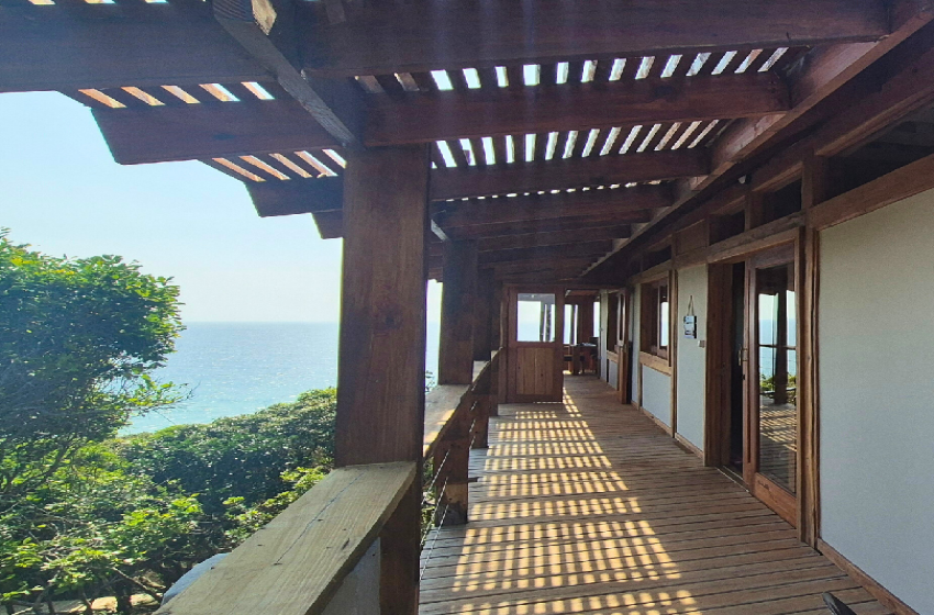 Wooden deck with sea view at V&K Peak in Ponta Mamoli