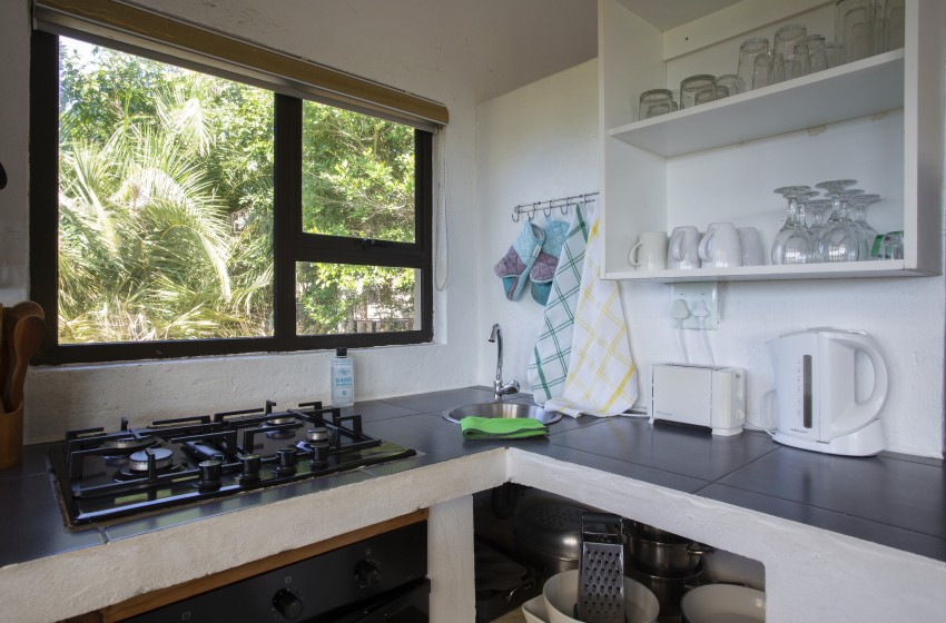 Kitchen at Baleia Azul 16 in Ponta Mamoli