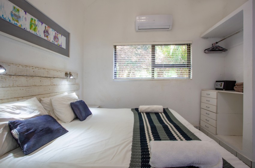 Bedroom at Baleia Azul 16 in Ponta Mamoli