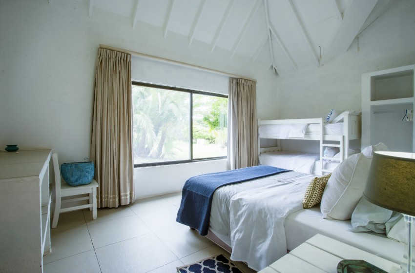 Bedroom 4 with bush view at Baleia Azul 20 in Ponta Mamoli