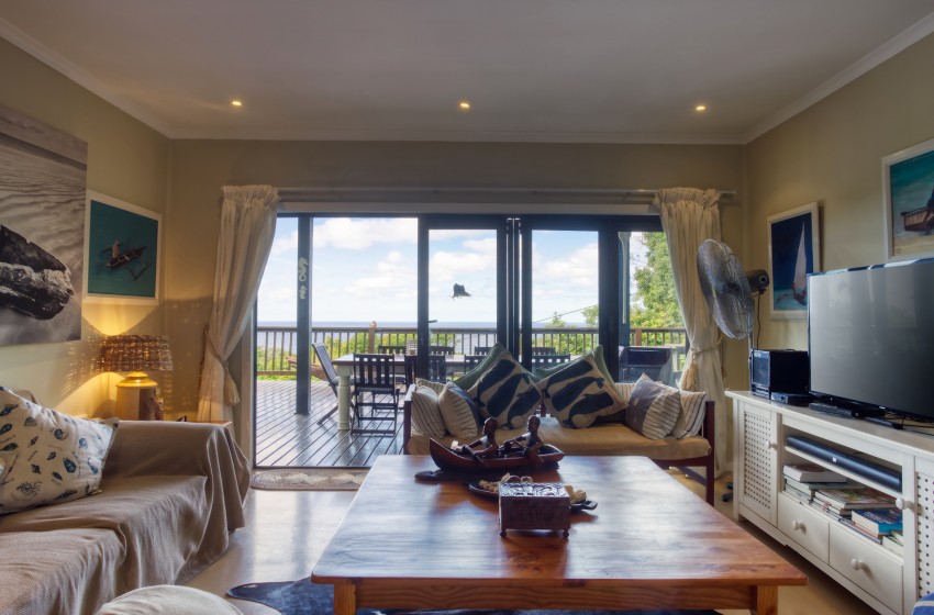 Living room with TV at Campismo Ninho 40 in Ponta Malongane