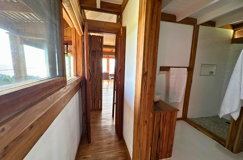 Passage with view of bathroom at Honey's House in Ponta Mamoli