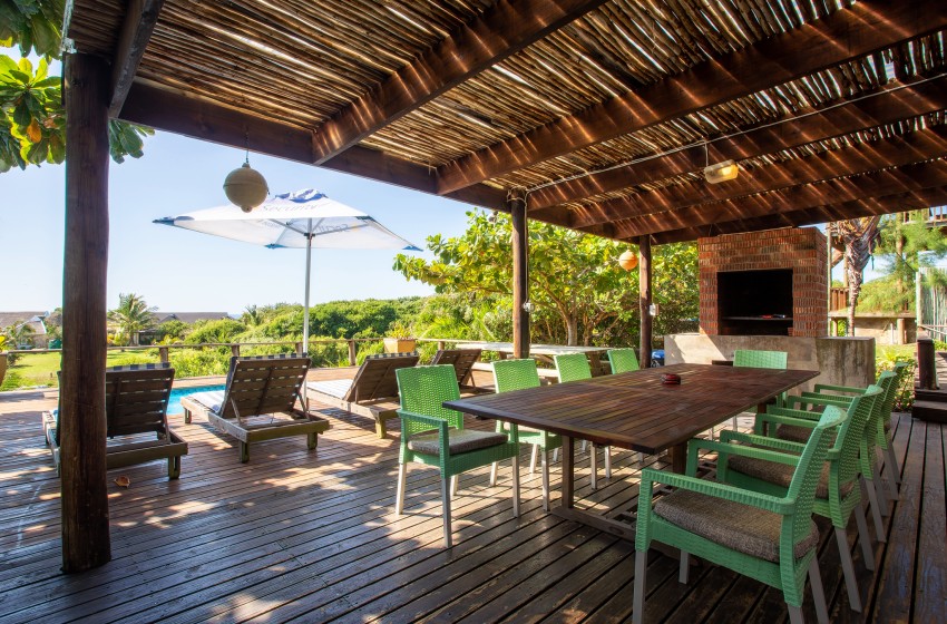 Braai and outside dining area at Baleia Azul 15 in Ponta Mamoli