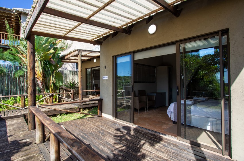 patio outside bedroom at Baleia Azul 15 in Ponta Mamoli