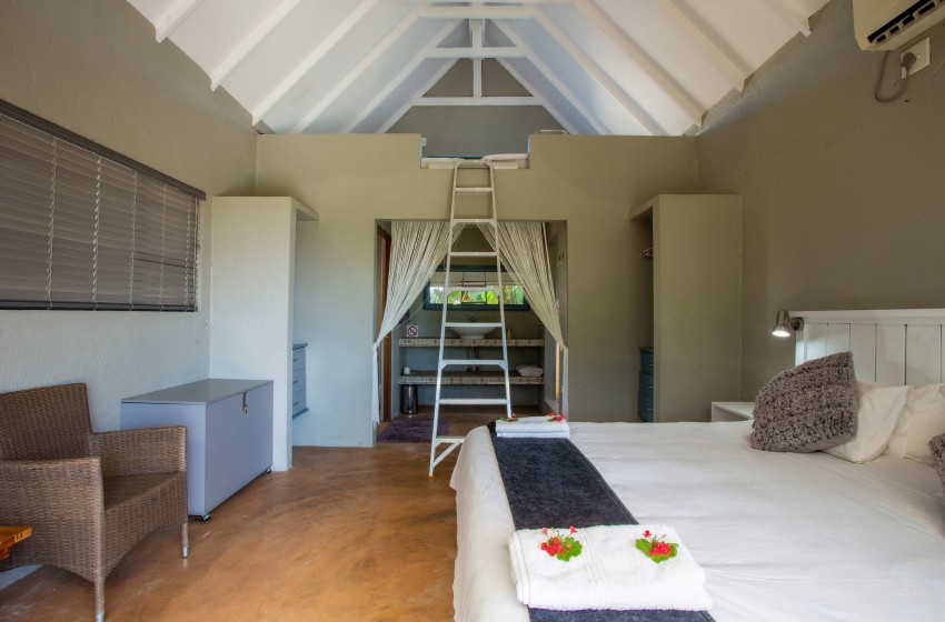 Bedroom with loft view at Baleia Azul 15 in Ponta Mamoli