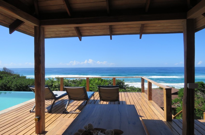 Swimming pool and outside seating at Aloha 16 in Ponta Mamoli