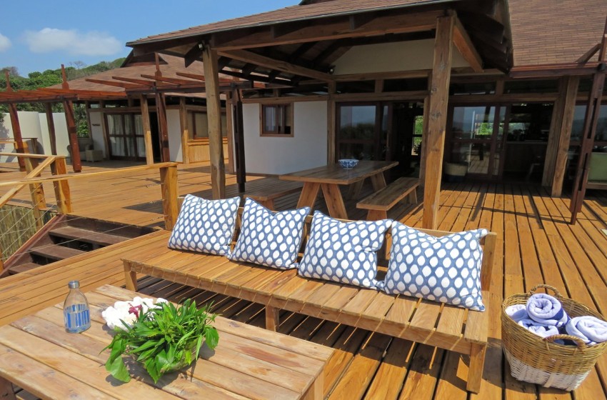 Seating and exterior view of Aloha 16 in Ponta Mamoli