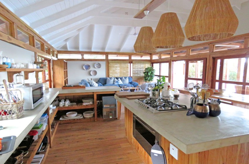 Kitchen with island at Aloha 16 in Ponta Mamoli
