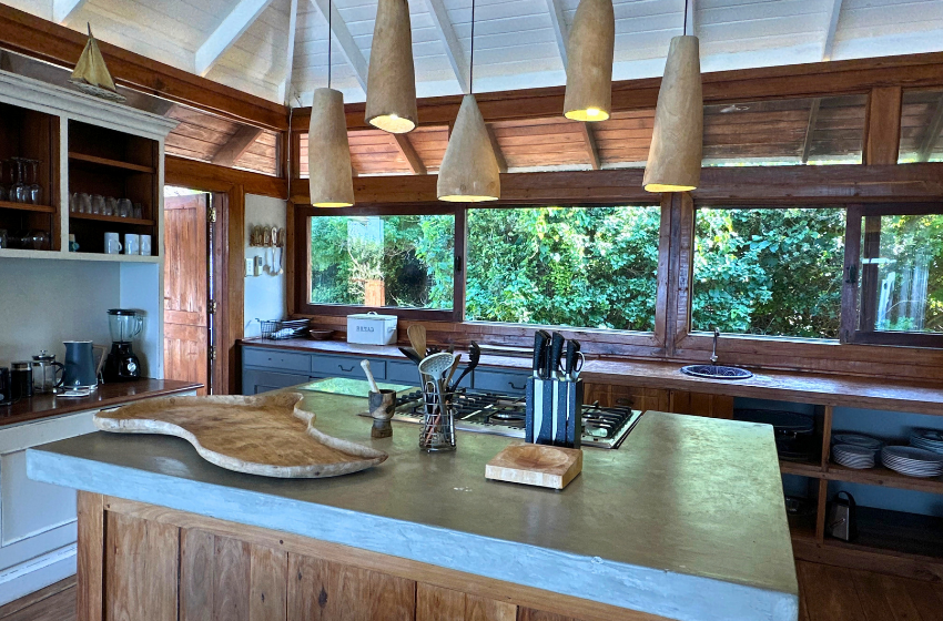 Kitchen with island at Aloha 17 in Ponta Mamoli