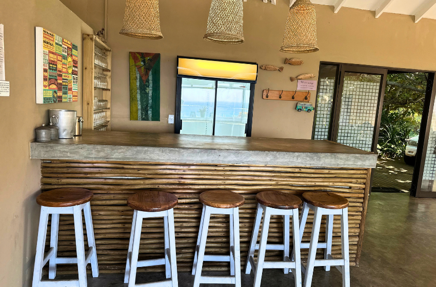 bar counter and stools at Baleia Azul 11 in Ponta Mamoli