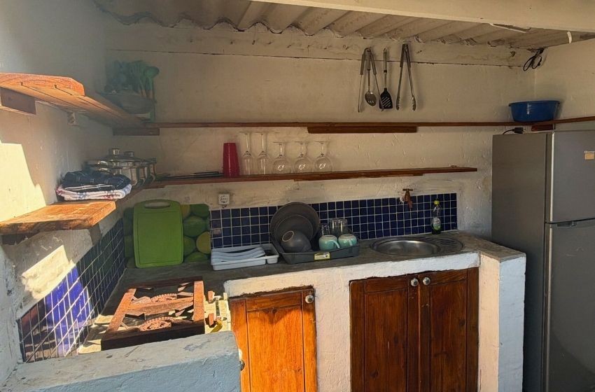 outdoor kitchen at Baleia azul beachfront tent 8 in Ponta Mamoli