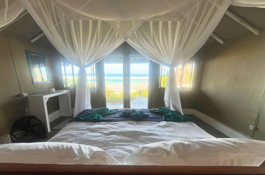 sea view from bed at Baleia azul beachfront tent 8 in Ponta Mamoli