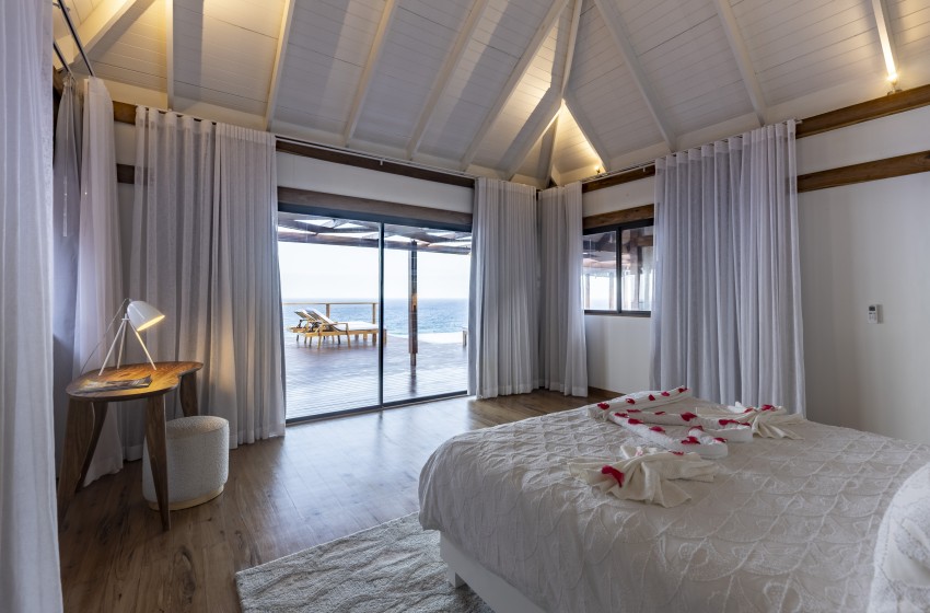 bedroom 1 with sea view at Aloha 8 in Ponta Mamoli