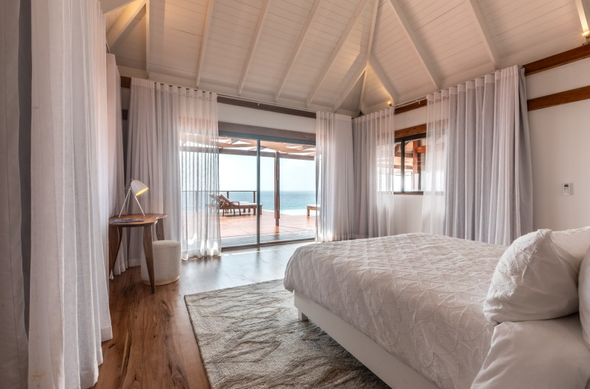 bedroom 2 with sea view at Aloha 8 in Ponta Mamoli