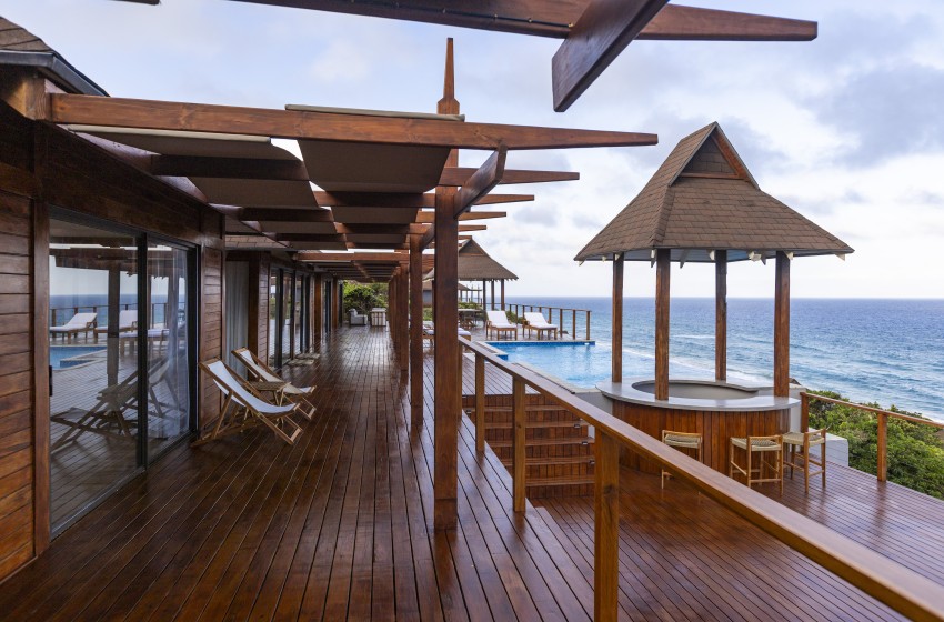 deck with gazebo and pool at Aloha 8 in Ponta Mamoli